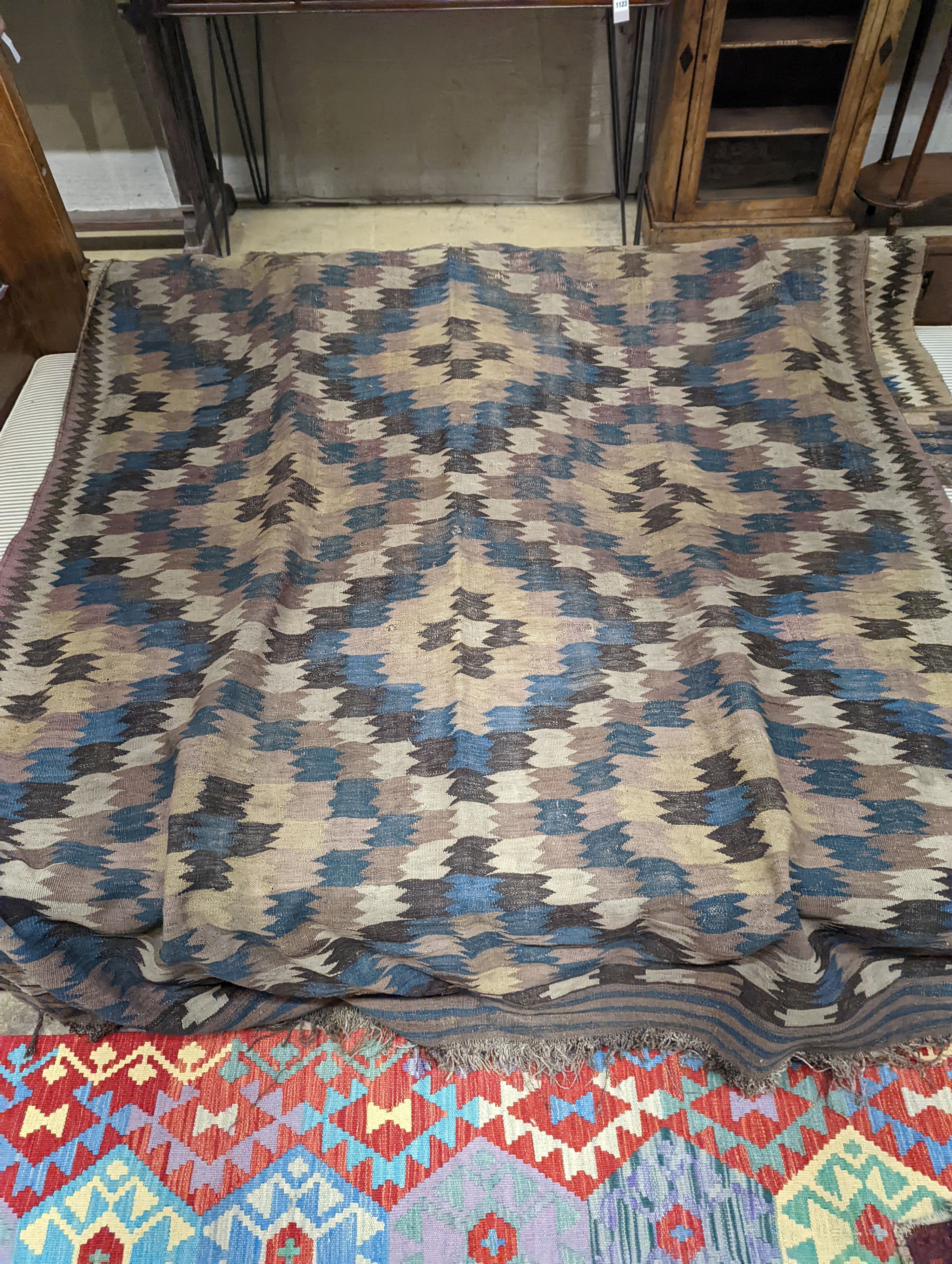 An antique Veramin Kilim hall carpet, 337 x 150cm
